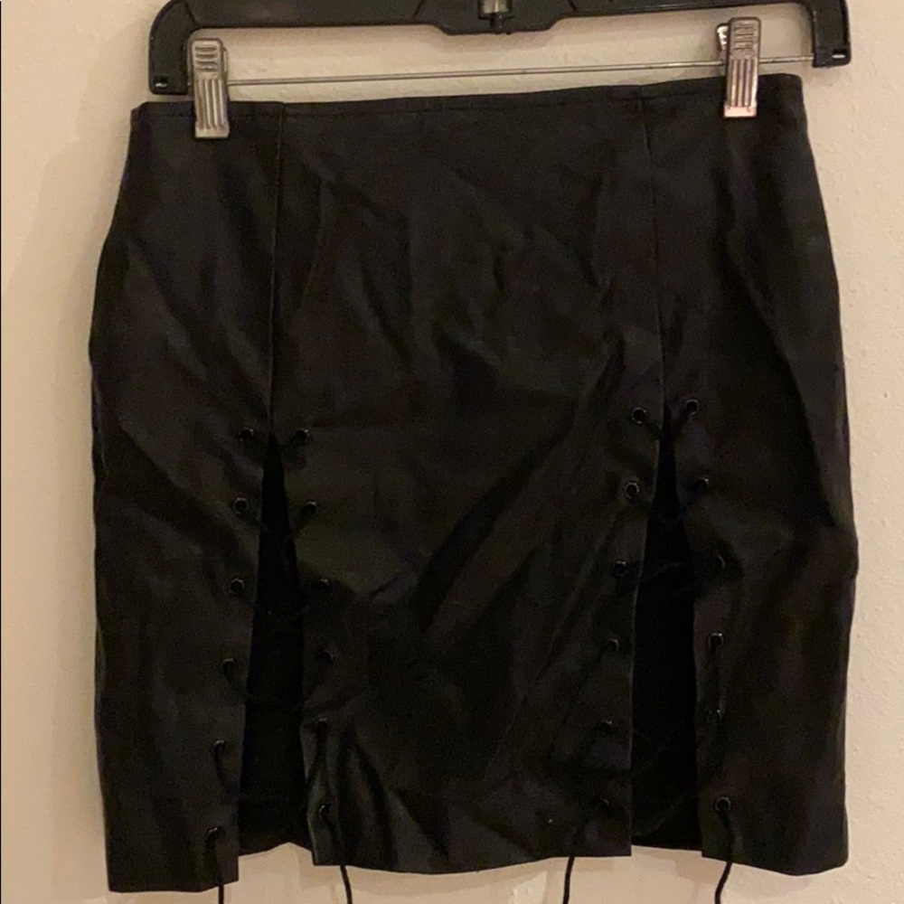 Black mini skirt with tie slits